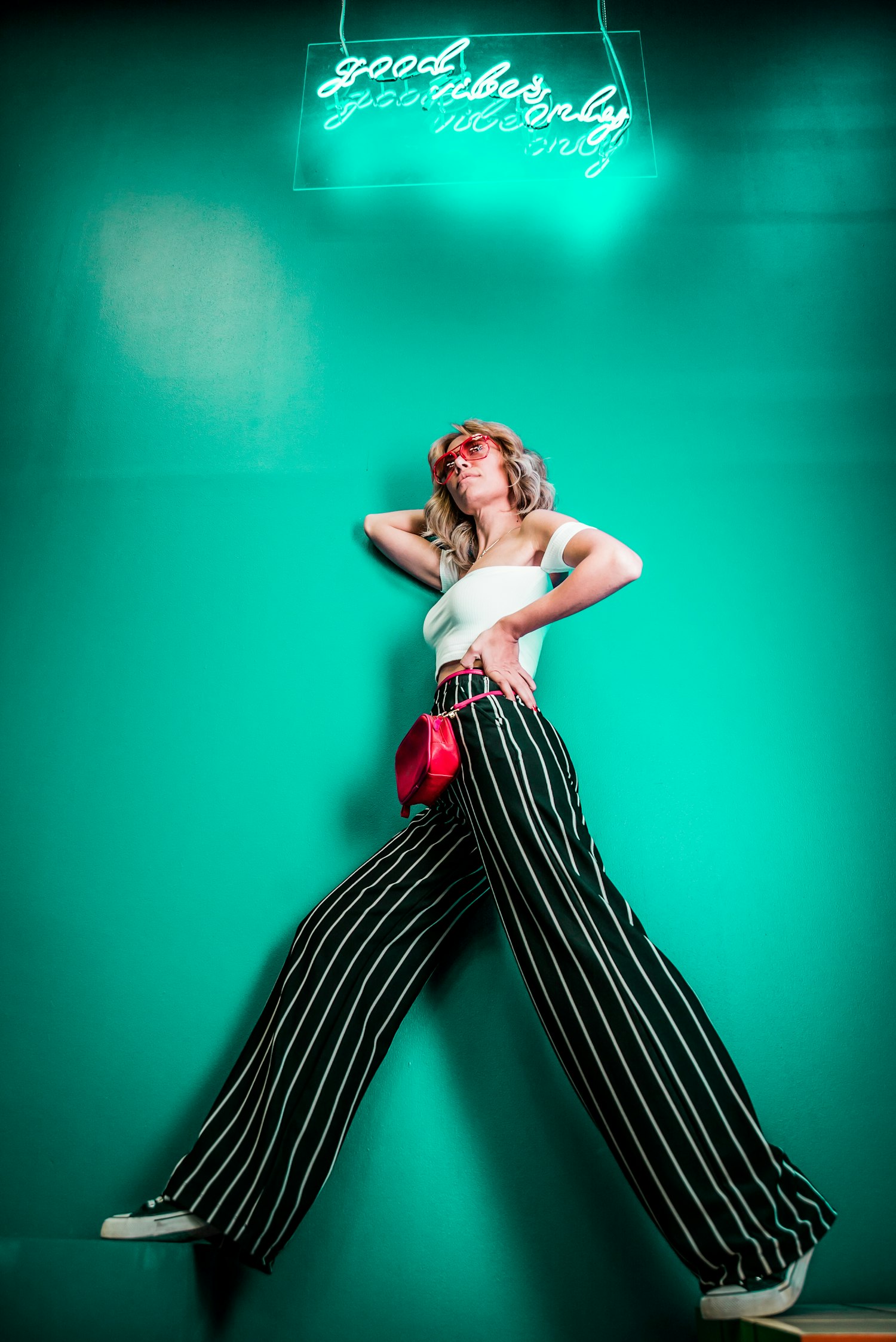 Full-length runway look in striped tailoring